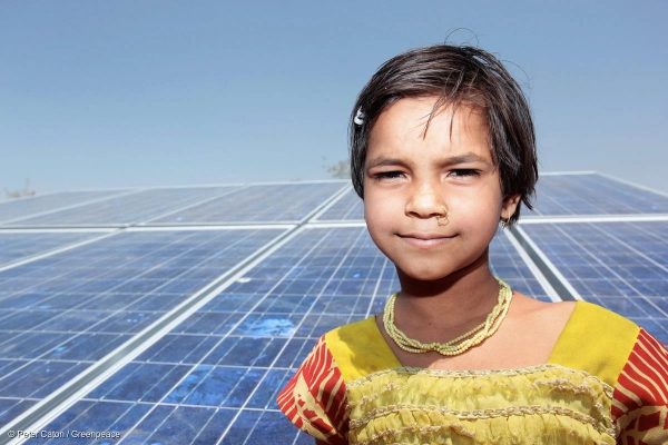 Gujarat India child and solar panel